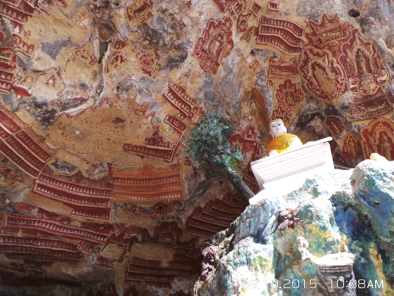 Historical Kawgun (Kawgoon) Cave is a natural limestone cave with clay Buddha images and terracotta votive tablets in its interior walls located in Hpa-An, Karen State, Myanmar.